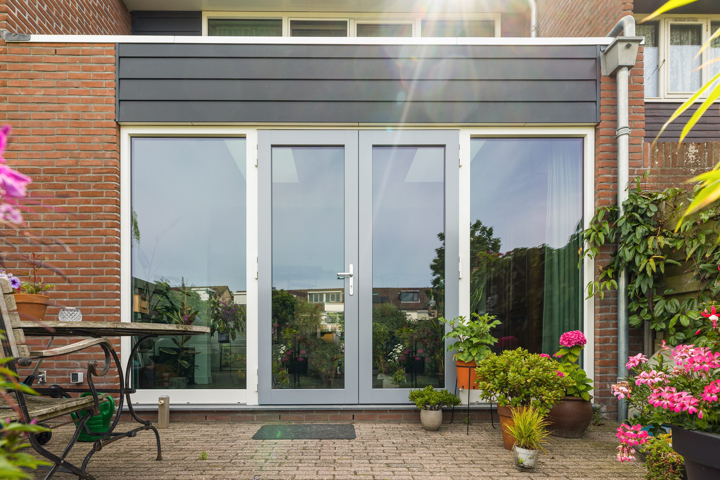 openslaande tuindeuren met zijlichten